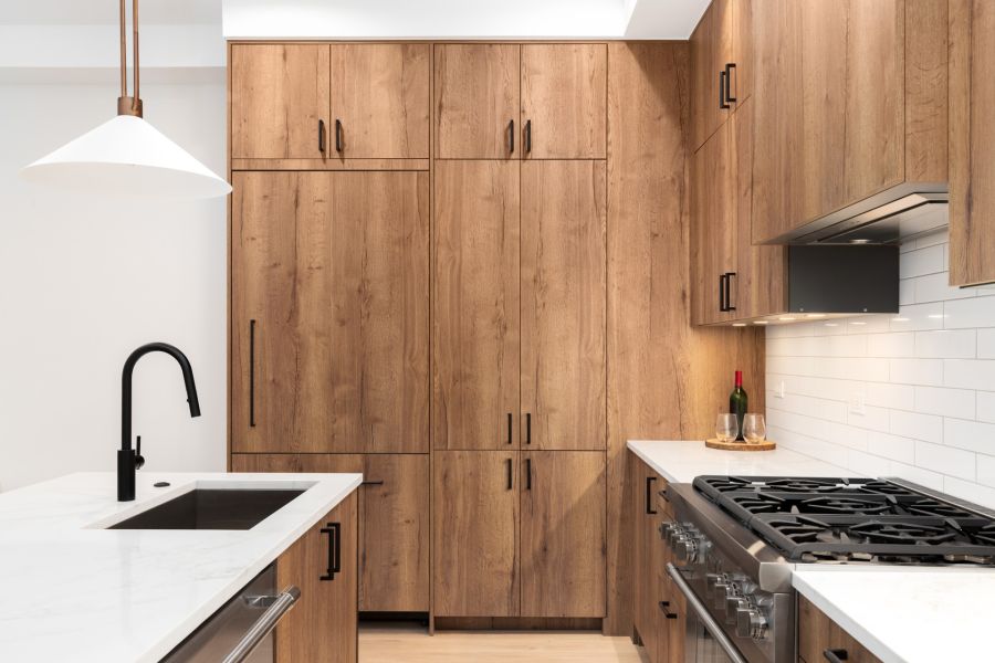 Cabinet Staining by M & M Developers Inc.